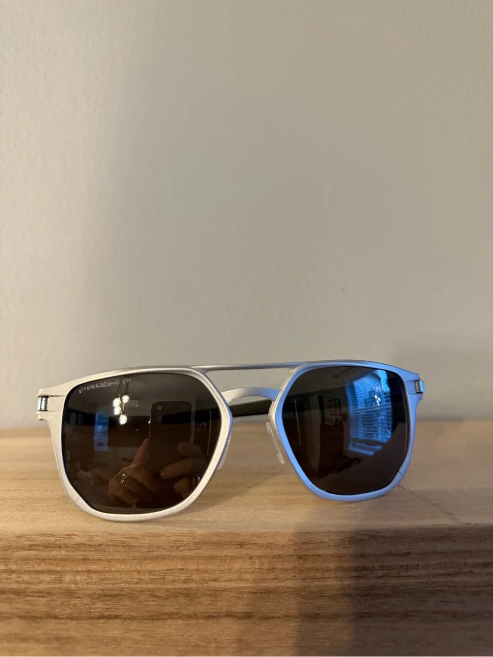 Oakley Latch Alpha Silver Framed Sunglasses with Dark Lenses